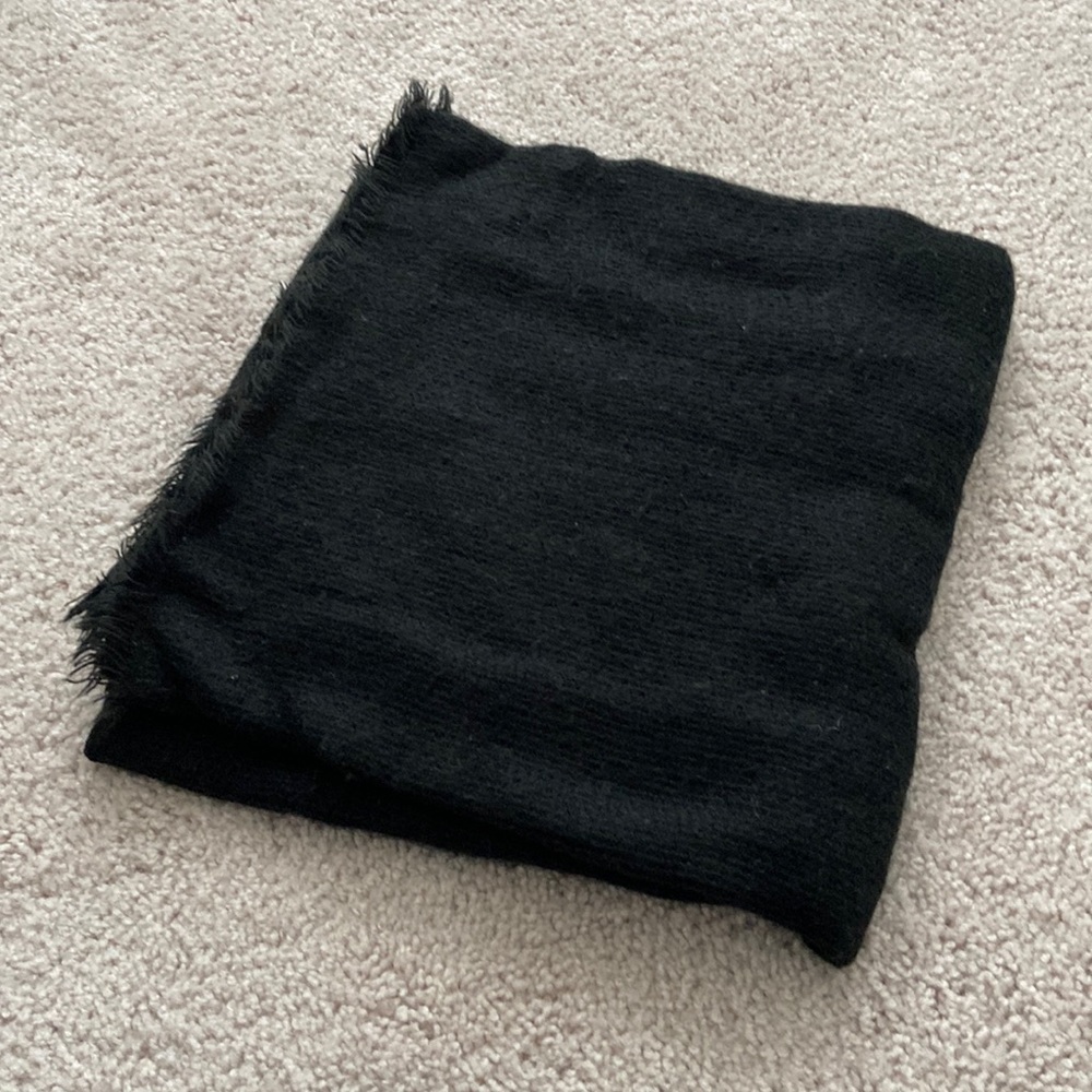 Black scarf, very large. Good for fall and winter.